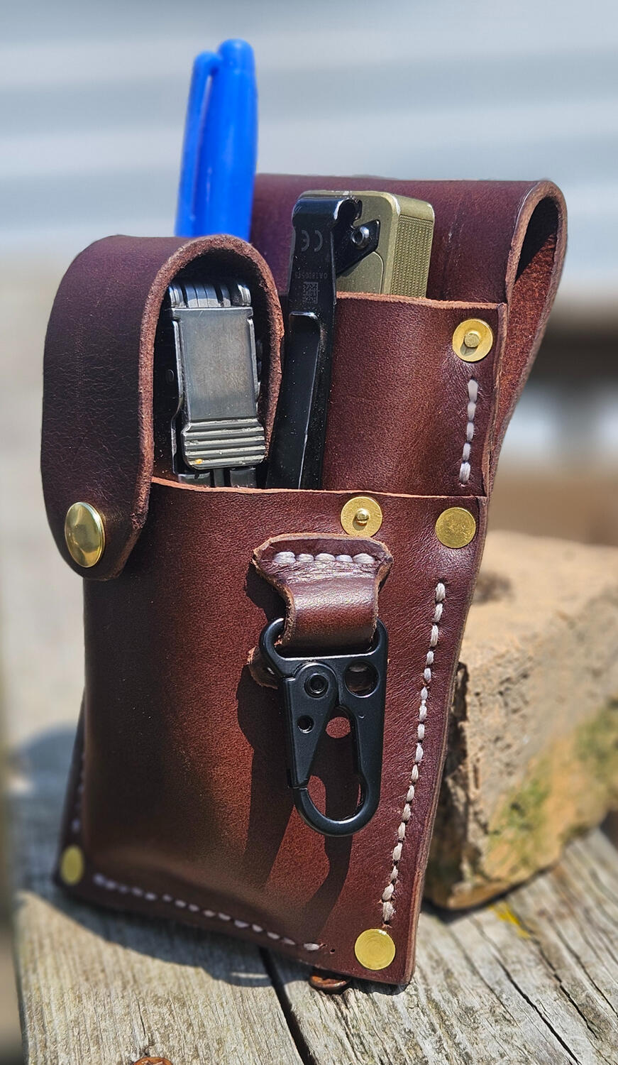 The Foremans carry | Flashlight, leatherman, sharpie, and key clip.